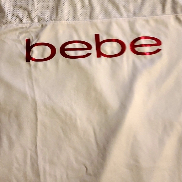 Bebe womens shirt size XL color White with Pink. Mesh back. - Picture 13 of 13